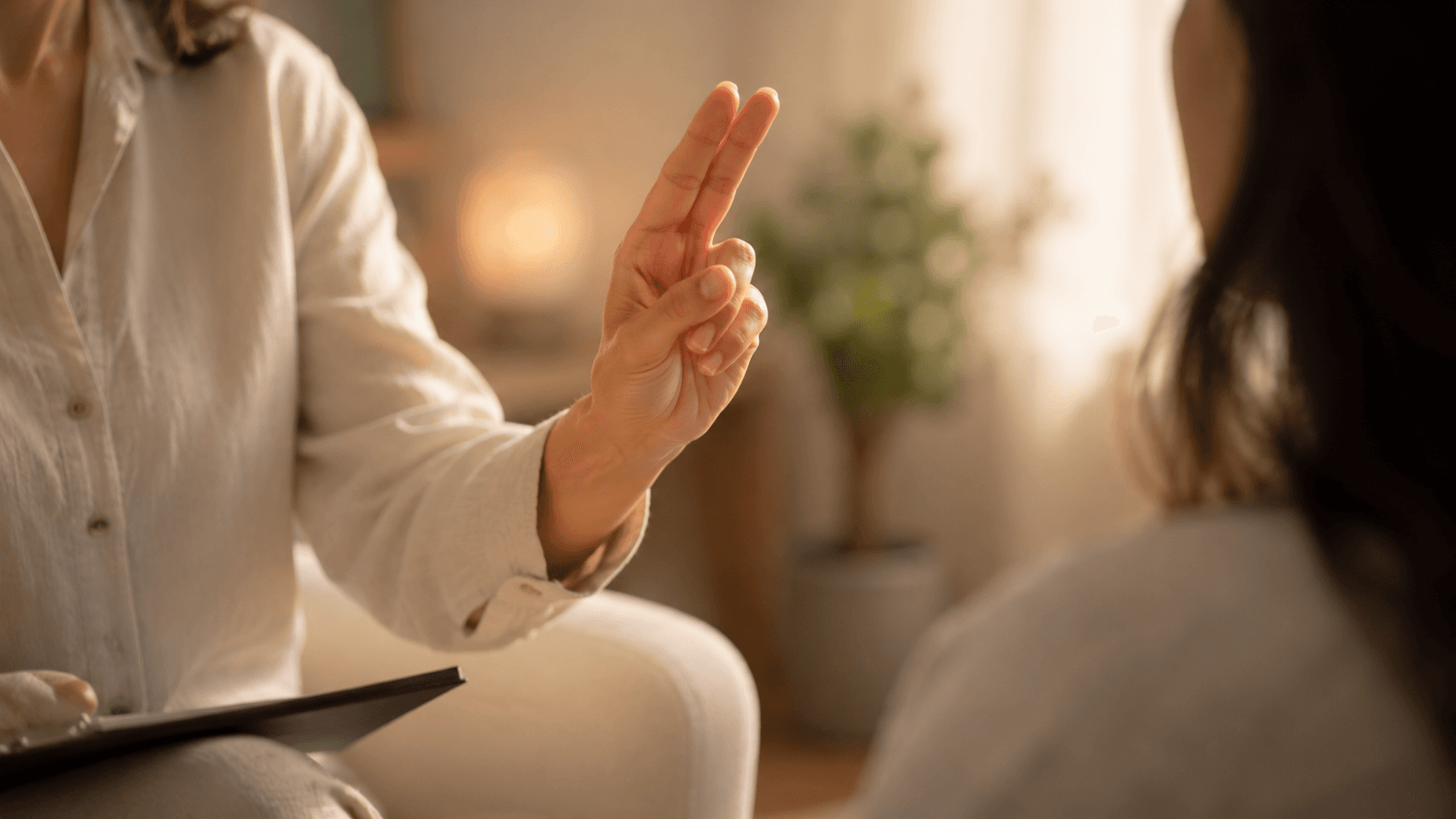 Close-up of EMDR bilateral stimulation during a trauma-informed therapy session at Enliven Counselling Center